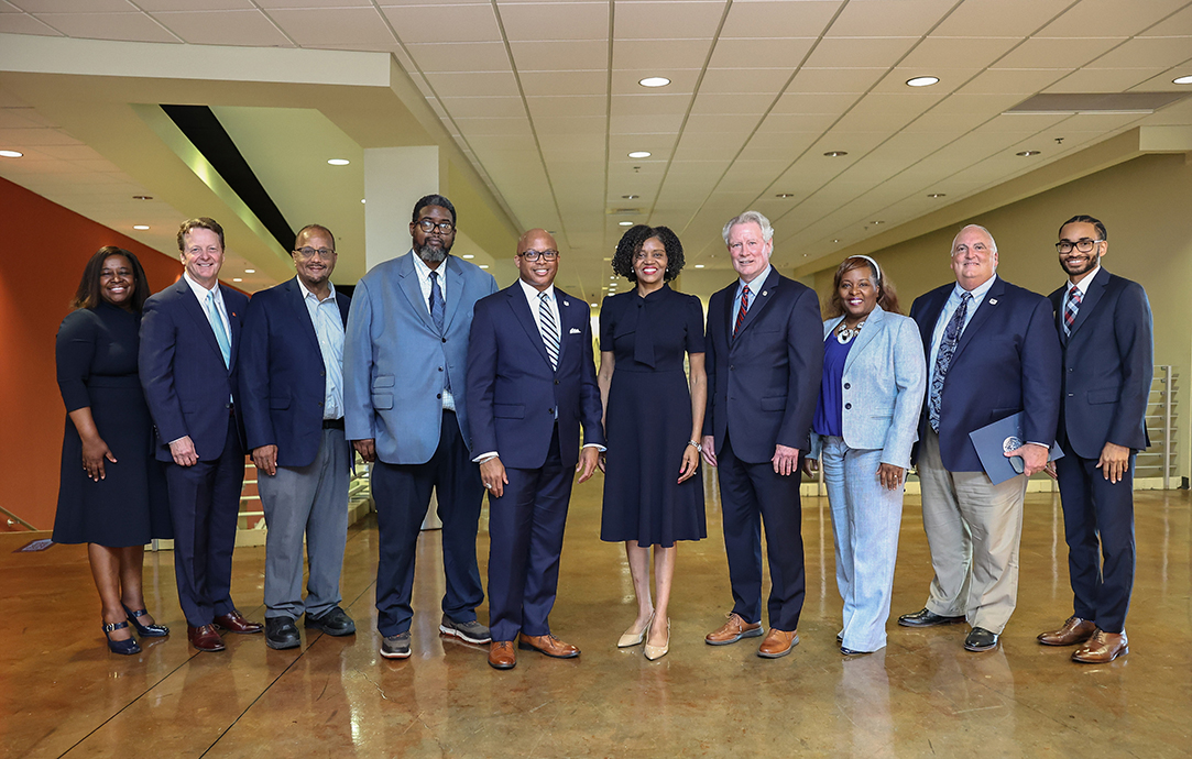 A group of leaders from Jackson State University and the University of Mississippi pose for a photo. 